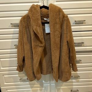 Light brown furry jacket. Super cozy. Brand new.